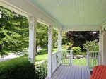 Step outside onto the covered porch 